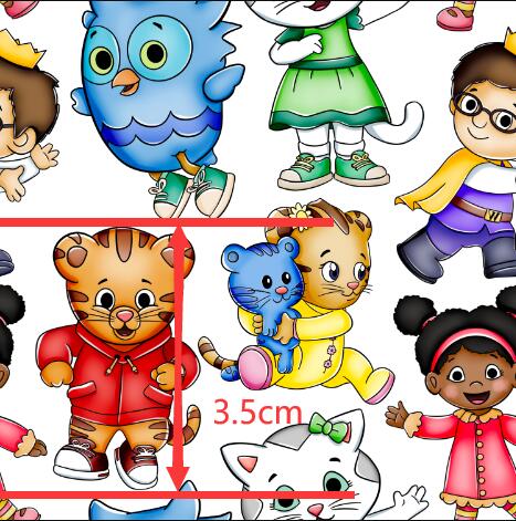 Daniel Tiger Printed Faux Leather Sheet Litchi has a pebble like feel with bright colors FeeFiFauxLeather