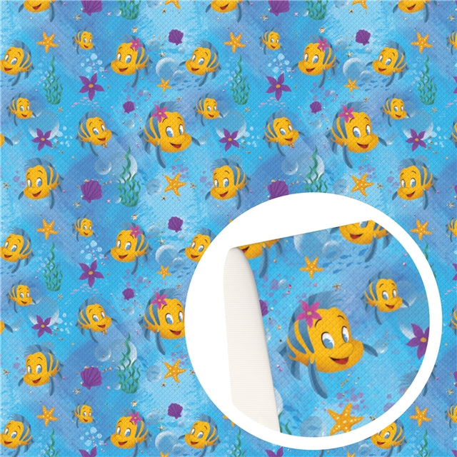 Flounder Little Mermaid Printed Faux Leather Sheet Litchi has a pebble like feel with bright colors
