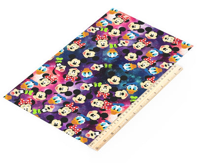 Characters Printed Faux Leather Sheet Litchi has a pebble like feel with bright colors