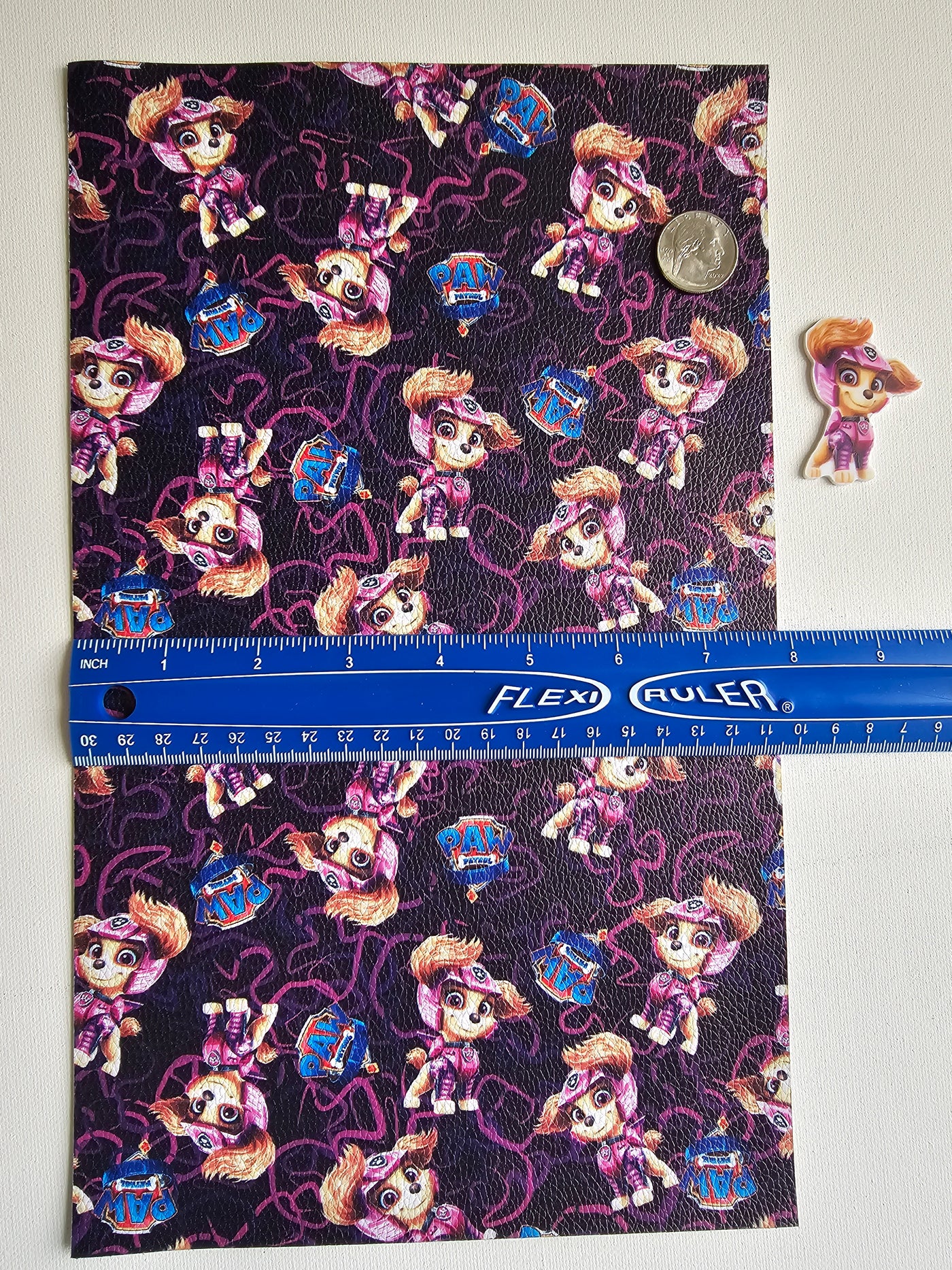 Paw Patrol Skye Litchi Printed Faux Leather Sheet Litchi has a pebble like feel with bright colors