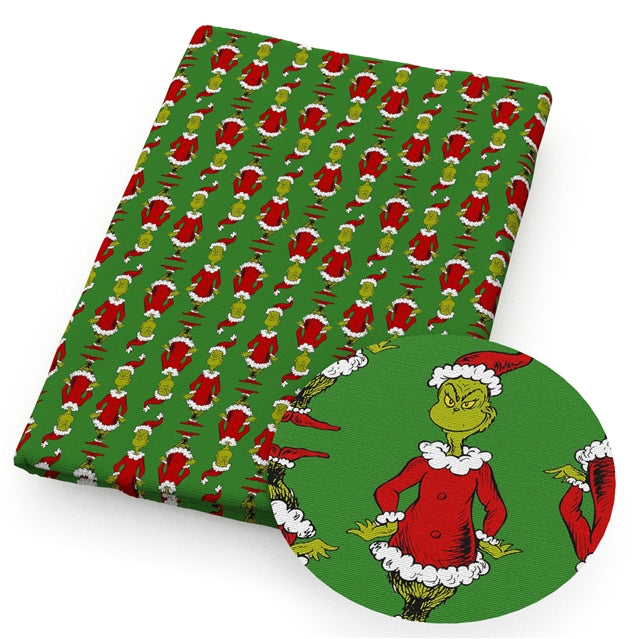 The Grinch Litchi Printed Faux Leather Sheet Litchi has a pebble like feel with bright colors