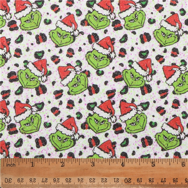 The Grinch Chunky Glitter Litchi Printed Faux Leather Sheet Litchi has a pebble like feel with bright colors