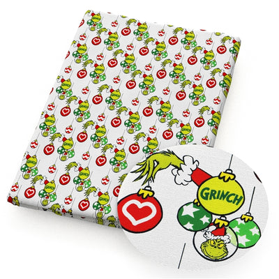 The Grinch Litchi Printed Faux Leather Sheet Litchi has a pebble like feel with bright colors