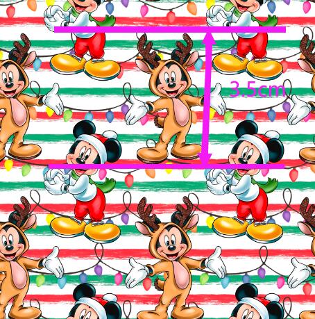 Mickey and Friends Christmas Textured Liverpool/ Bullet Fabric with a textured feel