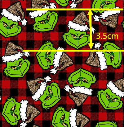 The Grinch Plaid Christmas Litchi Printed Faux Leather Sheet Litchi has a pebble like feel with bright colors