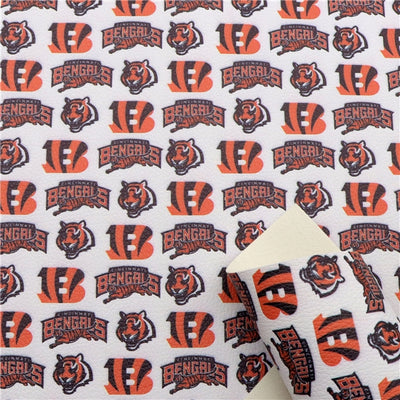Bengals Football Team Litchi Printed Faux Leather Sheet Litchi has a pebble like feel with bright colors