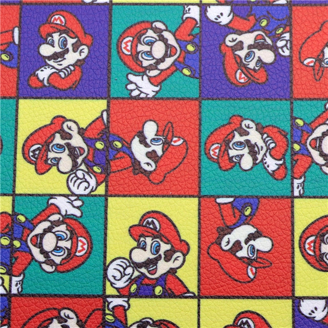 Mario Bros Litchi Printed Faux Leather Sheet Litchi has a pebble like feel with bright colors