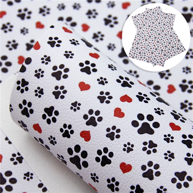 Dog Paw Prints with Hearts Litchi Printed Faux Leather Sheet Litchi has a pebble like feel with bright colors