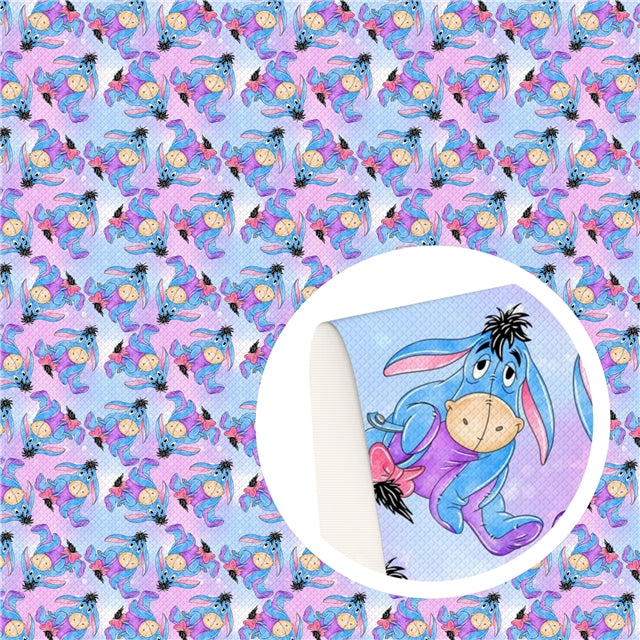 Eeyore Blue Donkey Litchi Printed Faux Leather Sheet Litchi has a pebble like feel with bright colors