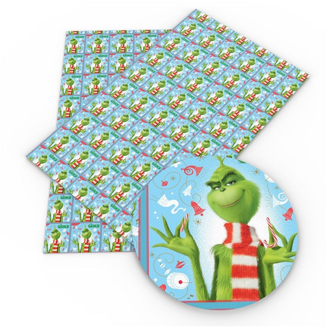 The Grinch Litchi Printed Faux Leather Sheet Litchi has a pebble like feel with bright colors