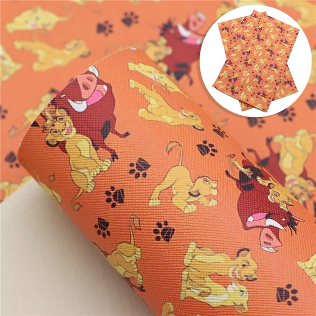 The Lion King Litchi Printed Faux Leather Sheet Litchi has a pebble like feel with bright colors