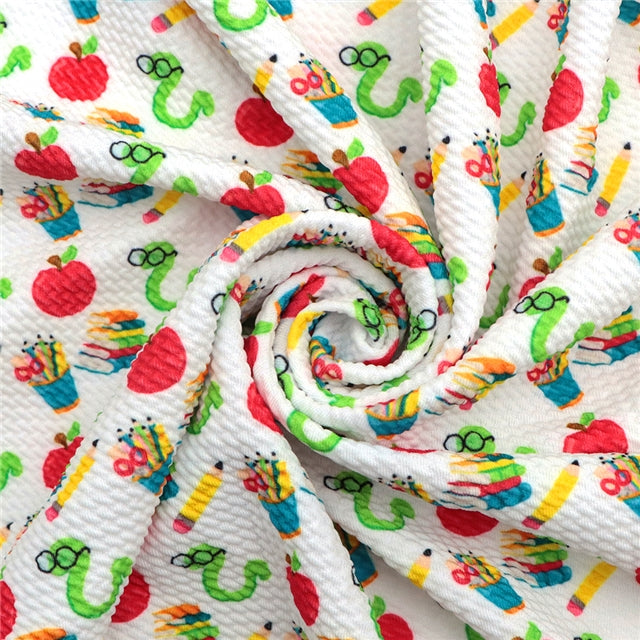 Back To School Apple and Worm Textured Liverpool/ Bullet Fabric with a textured feel and bright colors