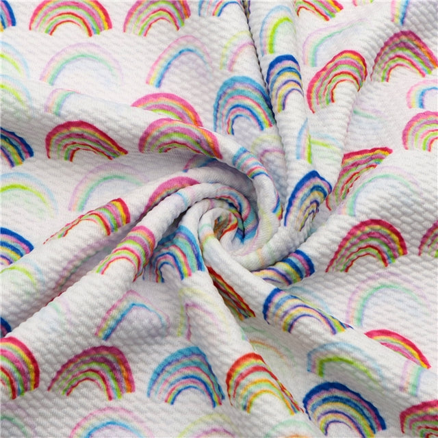 Rainbows Print Textured Liverpool/ Bullet Fabric with a textured feel