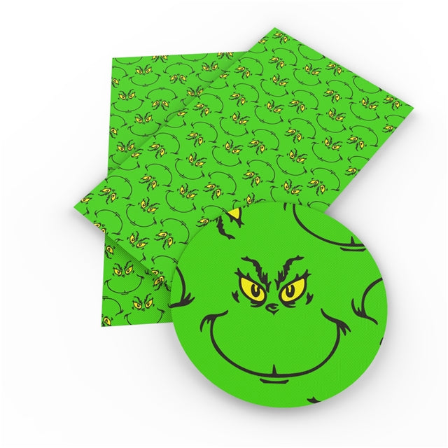The Grinch Litchi Printed Faux Leather Sheet Litchi has a pebble like feel with bright colors