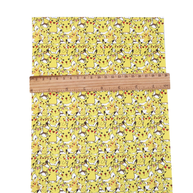 Pokemon Litchi Printed Faux Leather Sheet Litchi has a pebble like feel with bright colors