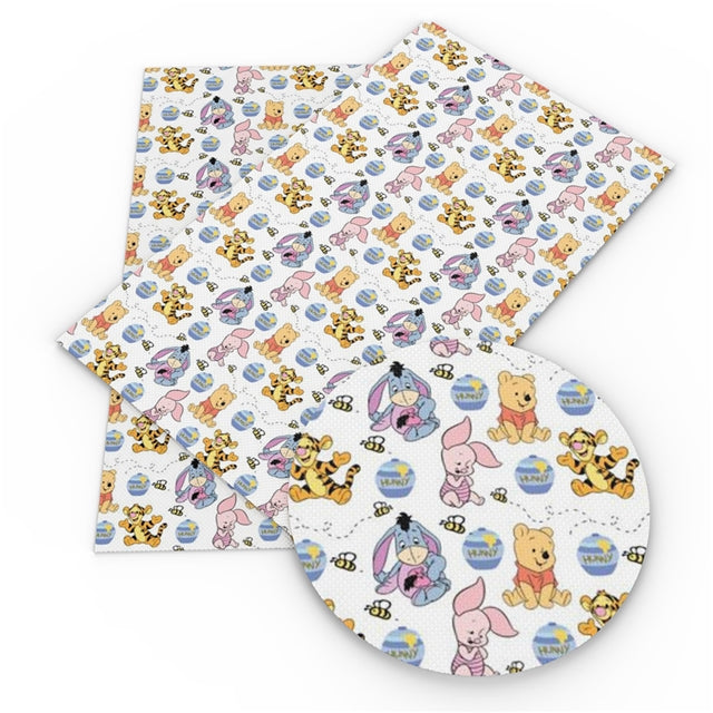 Winnie the Pooh Piglet Litchi Printed Faux Leather Sheet Litchi has a pebble like feel with bright colors