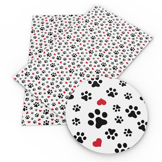 Dog Paw Prints with Hearts Litchi Printed Faux Leather Sheet Litchi has a pebble like feel with bright colors