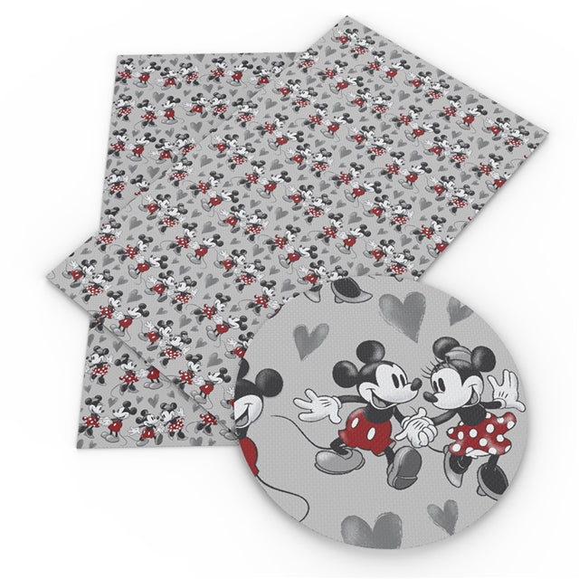 Mickey Mouse Hearts Litchi Printed Faux Leather Sheet Litchi has a pebble like feel with bright colors